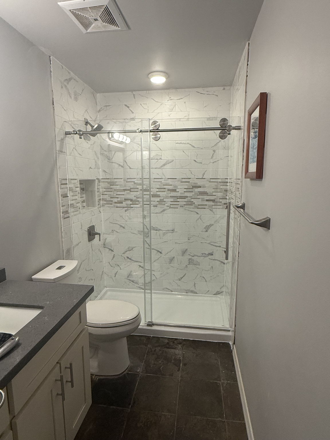 Finished shower remodel with glass doors